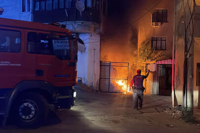 Evin bahçesinde başlayan yangın yandaki işyerine sıçradı