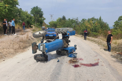 Oğlunun kullandığı traktörün altında can verdi