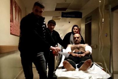 Ağaç soyma makinesine kollarını kaptırdı