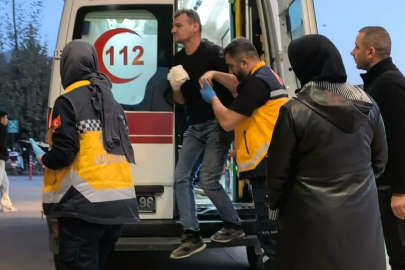 Eli traktörün hidrolik sistemine sıkışan çiftçi yaralandı