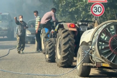 Çiftçiler traktörleriyle yangın bölgesine koştu