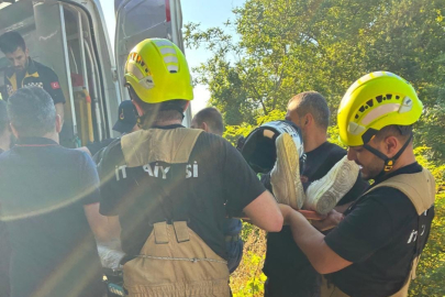 Şarampole yuvarlanan kadın motosikletçi yaralandı