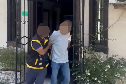Polise yakalanmamak için saçını kazıttı!