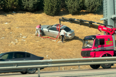Bursa'da otomobil bariyerleri aşarak tarlaya uçtu