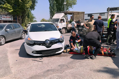 İnegöl'de iki otomobil ile çarpışan motosikletin sürücüsü yaralandı