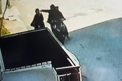 Bursa'da telefonla konuşurken kapkaça uğradı